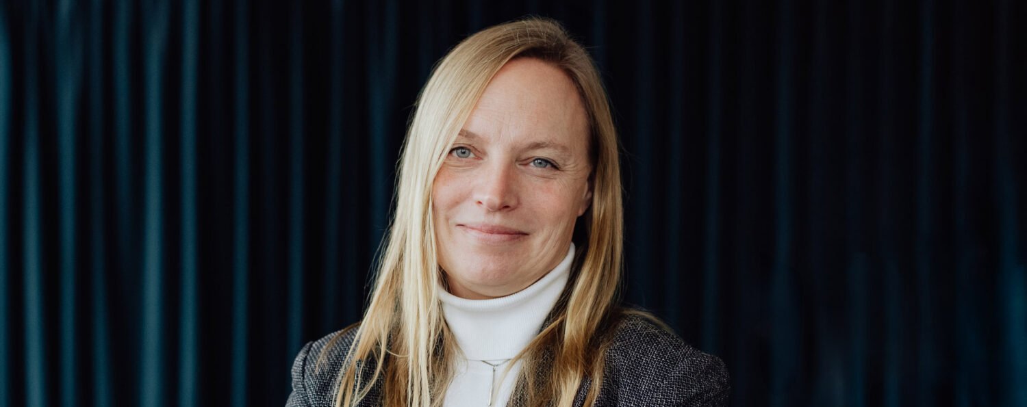 What is coaching, with Elisabeth Santruschitz at Jalis AB illustrated by a photo of Elisabeth looking right into the camera with a warm smile